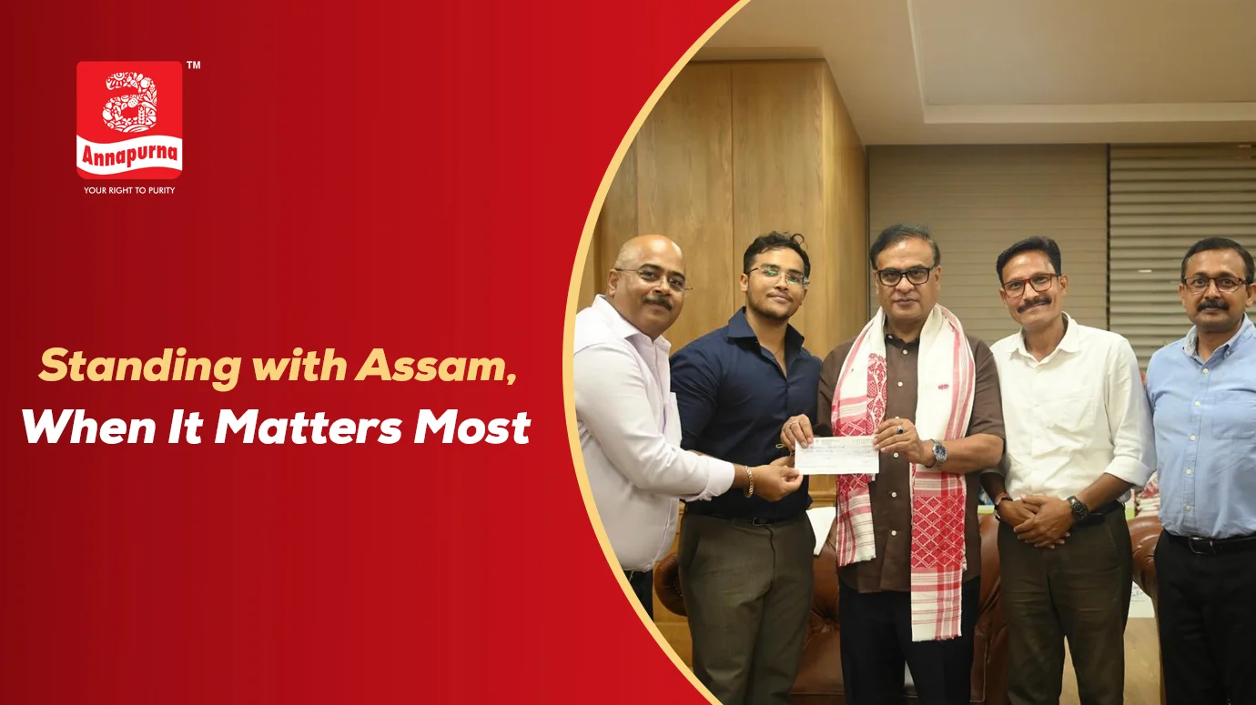 Annapurna representatives presenting support to Assam during a challenging time